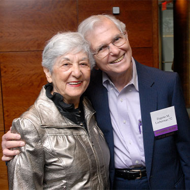 Couple hugging and smiling. Read about Closely Held Business Stock Couple hugging and smiling. Read about Closely Held Business Stock
