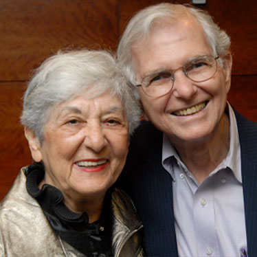 Couple smiling together at camera. Read about Gifts That Protect Your Assets Couple smiling together at camera. Read about Gifts That Protect Your Assets